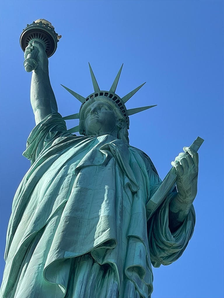 Statue of Liberty representing freedom, divine illumination, and spiritual symbolism